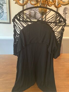 LAST CHANCE!! Black Mini Dress with cage short sleeve detail.